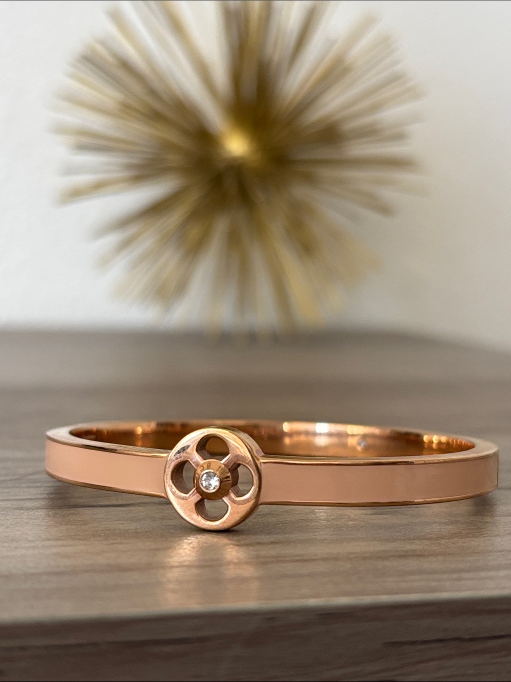henri bendel tan and Rose Gold Floral Bangle with Crystal detail -hinges open